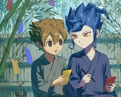  2boys bamboo blue_hair blue_kimono brown_hair commentary double-parted_bangs fence grey_eyes hair_between_eyes holding holding_tanzaku inazuma_eleven_(series) inazuma_eleven_go japanese_clothes kimono looking_at_another male_focus matsukaze_tenma mint999inir multiple_boys outdoors short_hair sidelocks spiky_hair standing tanabata tanzaku tareme tsurime tsurugi_kyousuke upper_body wide_sleeves wooden_fence yellow_eyes yukata 
