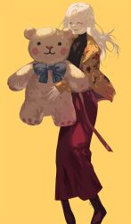  1girl asymmetrical_bangs black_sweater boots brown_boots closed_eyes curtained_hair floral_print_jacket full_body happy highres holding holding_stuffed_toy jacket lace-up_boots large_teddy_bear long_hair long_skirt long_sleeves open_clothes open_jacket open_mouth original p_(pkochan) red_skirt simple_background skirt sleeves_past_wrists smile solo stuffed_toy sweater turtleneck turtleneck_sweater white_hair yellow_background yellow_jacket 