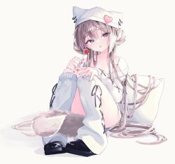  1girl animal_ears animal_hat arm_on_own_leg black_shoes candy cat_ears cat_hat collarbone commentary_request double-parted_bangs fake_tail food grey_eyes grey_hair hair_between_eyes hand_on_own_knee hat head_tilt heart highres holding holding_candy holding_food holding_lollipop inubouzaki_(i_nu1515) kneehighs knees_together_feet_apart lollipop long_hair long_sleeves looking_at_viewer off_shoulder original parted_lips pigeon-toed shoes simple_background sitting socks solo sweater tail unnamed_girl_(inubouzaki) very_long_hair white_background white_socks white_sweater 