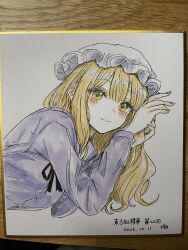  1girl absurdres black_ribbon blush closed_mouth commentary_request dated dress hat highres kashiwada_kiiho long_sleeves looking_at_viewer maribel_hearn mob_cap neck_ribbon photo_(medium) purple_dress ribbon shikishi signature simple_background smile solo touhou traditional_media translation_request upper_body white_background white_hat 