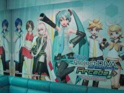 2boys 3d 4girls aqua_background aqua_hair aqua_necktie aqua_trim belt black_pants black_shorts blonde_hair blue_eyes blue_hair brown_eyes brown_hair collared_shirt crypton_future_media detached_sleeves english_text frutiger_aero hatsune_miku headphones indoors jacket japanese_text kagamine_len kagamine_rin kaito knee_boots leg_up long_coat long_hair long_shorts long_sleeves looking_at_viewer megurine_luka meiko midriff navel official_art photo photo_(medium) piapro pink_hair project_diva_(series) project_diva_arcade_future_tone promo_poster promotional_art real_life red_shirt red_skirt sailor_collar sailor_shirt seifuku short_hair shorts_under_skirt sleeveless thigh-highs very_long_hair vocaloid wall wallpaper yellow_bow yellow_tie yellow_trim