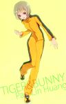  blonde_hair bruce_lee's_jumpsuit huang_baoling jumpsuit open_mouth paolin_huan short_hair solo tiger_&amp;_bunny 