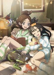  2girls :d alternate_costume black_hair book brown_eyes brown_hair character_doll closed_eyes commentary_request doll floette floette_(eternal) harmony_(pokemon) highres hood hood_down indoors jacket knees lida_(pokemon) long_hair long_sleeves multiple_girls nariwami_(srhd3848) on_bed open_mouth pokemon pokemon_(creature) pokemon_legends:_z-a shorts smile staryu tatsugiri teeth topknot upper_teeth_only watermark zygarde zygarde_(10) 