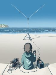  1girl antennae beach blue_sky brown_hair clear_sky commentary_request controller day food from_behind full_body green_hoodie ham ham_radio headphones highres hood hood_down hoodie horizon lighthouse long_sleeves minobe_ghenki ocean original outdoors pun remote_control sand shadow short_hair sitting sky sliced_meat solo vanishing_point waves wire 