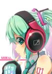  1girl bare_shoulders detached_sleeves green_eyes green_hair hatsune_miku headphones heart heart-shaped_pupils kouji_(campus_life) necktie pointing pointing_at_self sennheiser solo symbol-shaped_pupils tattoo twintails vocaloid 