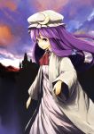  blush crescent hat lefthand long_hair pajamas patchouli_knowledge purple_eyes purple_hair scarlet_devil_mansion solo touhou violet_eyes 