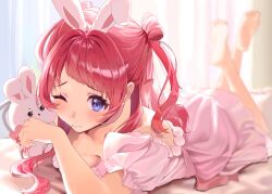  1girl animal_ears barefoot blue_eyes blush breasts commentary_request gakuen_idolmaster hanami_saki highres idolmaster lllllaaaaauuu long_hair looking_at_viewer negligee on_bed one_eye_closed pink_negligee rabbit_ears red_hair smile solo stuffed_toy two_side_up 