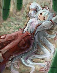  1girl arms_behind_head closed_mouth commentary_request fujiwara_no_mokou grey_hair hair_between_eyes highres long_hair long_sleeves looking_at_viewer lying ofuda ofuda_on_clothes omaega_chan on_back pants red_eyes red_pants shirt smile solo suspender_pants touhou very_long_hair white_shirt 