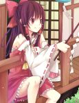  ascot bad_id bare_shoulders black_hair bow cranio detached_sleeves food fruit gohei hair_bow hair_tubes hakurei_reimu long_hair miko porch sarashi sitting smile solo touhou veranda watermelon wind_chime 