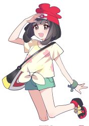  1girl bag beanie black_hair blush collarbone commentary floral_print green_shorts hat highres open_mouth pokemon pokemon_sun_and_moon red_hat selene_(pokemon) shirt shocho_(shaojiujiu) shoes short_hair short_sleeves shorts shoulder_bag simple_background smile standing standing_on_one_leg tied_shirt untranslatable_commentary white_background yellow_shirt 