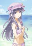  bad_id bare_shoulders beach bikini breasts butterfly crescent hand_on_own_chest hand_to_chest hat long_hair navel ocean patchouli_knowledge purple_hair sky solo swimsuit touhou water y_(sy20) 