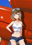  blue_eyes charlotte_e_yeager cutoffs front-tie_top gloves goggles goggles_on_head hand_on_hip hat highres hips navel orange_hair shiny shiny_skin shorts smile strike_witches tank_top tied_shirt yumekaranigeruna 