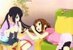  bag bike_shorts black_hair black_legwear brown_eyes brown_hair cellphone cellphone_strap chair couch dress footwear hair_tussle highres hirasawa_yui k-on! long_hair multiple_girls nakano_azusa no_shoes object_in_mouth official_art on_side open_mouth phone pillow red_eyes shorts sitting socks suspenders twintails 