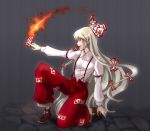  fire flame fujiwara_no_mokou highres kneeling long_hair mouth_hold nanashiba ofuda one_knee profile solo touhou 