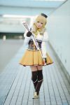  blonde_hair cosplay gun mahou_shoujo_madoka_magica rifle tomoe_mami 