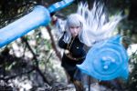  bangs black_legwear boots breasts cosplay crystal_graziano grey_hair lance large_breasts long_hair looking_at_viewer non-asian onpaperwings photo polearm running selvaria_bles selvaria_bles_(cosplay) senjou_no_valkyria shield weapon 