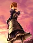  ahoge armor armored_dress blonde_hair dress excalibur fate/stay_night fate_(series) faulds from_behind gauntlets green_eyes hair_bun highres obaoba_(monkeyix) saber solo sunset sword weapon 