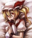  bed blonde_hair chain chains cuffs flandre_scarlet hat hat_ribbon holding laevatein looking_at_viewer lying manobana_nodoka manoha_(sawayaka-batake) mouth_hold on_back pillow pillow_hug puffy_sleeves red_eyes ribbon shackles short_hair short_sleeves side_ponytail solo the_embodiment_of_scarlet_devil touhou 