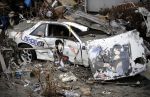  2011_sendai_earthquake_and_tsunami akiyama_mio bad_end car itasha k-on! motor_vehicle philippe_lopez_(photographer) photo vehicle 