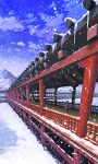  1girl black_hair blue_sky bridge building cloud clouds east_asian_architecture ground hakama hill japanese_clothes kimono long_hair miko new_year original ponytail scenery sky snow snowing solo walking wide_sleeves winter 