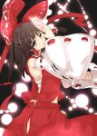  bow brown_hair danmaku detached_sleeves hair_bow hakurei_reimu highres japanese_clothes katanakko_daisuki looking_at_viewer miko no_nose ofuda pink_eyes smile solo touhou 