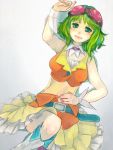 goggles_on_head green_eyes green_hair gumi lying midriff on_back short_hair simple_background skirt smile solo vocaloid wrist_cuffs 