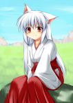  animal_ears cat_ears hakama hoshizuki_(seigetsu) japanese_clothes miko original red_eyes silver_hair sitting sleeves_past_wrists smile solo wide_sleeves 