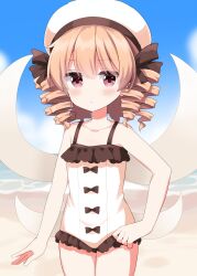  1girl alternate_costume beach blonde_hair closed_mouth clouds collarbone commentary_request day drill_hair fairy fairy_wings hat highres looking_at_viewer luna_child medium_hair ocean one-piece_swimsuit outdoors pink_eyes ruu_(tksymkw) sand swimsuit touhou white_hat white_one-piece_swimsuit wings 