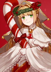  1girl ahoge bell blonde_hair blush braid candy candy_cane chocojax fate/grand_order fate_(series) food gloves green_eyes hair_intakes holding holding_candy holding_candy_cane holding_food jingle_bell long_sleeves looking_at_viewer nero_claudius_(fate) oversized_food oversized_object red_background smile solo veil white_gloves 