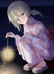  1girl beach blush brown_eyes brown_hair commentary_request fireworks floral_print flower grin hair_between_eyes hair_flower hair_ornament hairclip hand_on_own_knee highres holding holding_fireworks horizon japanese_clothes kimono long_sleeves looking_at_viewer low_ponytail masamune_mino minowa_gin night obi ocean outdoors pink_kimono ponytail print_kimono sandals sash sky smile solo sparkler squatting star_(sky) toes v-shaped_eyebrows washio_sumi_wa_yuusha_de_aru wide_sleeves yukata yuusha_de_aru zouri 