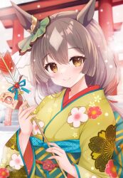  1girl animal_ears arrow_(projectile) bell blush brown_eyes brown_hair brown_kimono closed_mouth commentary_request ema hair_between_eyes hamaya highres holding holding_arrow horse_ears japanese_clothes jingle_bell kimono long_hair long_sleeves looking_at_viewer multicolored_hair obi sash satono_diamond_(umamusume) smile solo terimuku torii two-tone_hair umamusume upper_body very_long_hair wide_sleeves 