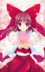  ascot bad_id bow brown_eyes brown_hair hair_bow hakurei_reimu heart highres large_bow looking_at_viewer midriff open_hands outstretched_arms petals philomelalilium smile solo touhou 