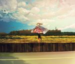  black_legwear blue_eyes boots brown_hair building cape cloud clouds dress feathers felt fence field flower grass head_wreath highres landscape long_hair long_legs nature original pantyhose red_dress road scenery sky solo standing_on_one_leg wind wooden_fence 