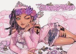  1girl alternate_costume arm_tattoo bag bare_shoulders bed black_hair bow cellphone dark-skinned_female dark_skin denim denim_skirt dragona_joestar dreadlocks eyelashes fingernails frilled_skirt frills green_eyes handbag head_wreath heart heart-shaped_pillow heart_ring highres jewelry jojo_no_kimyou_na_bouken lipstick long_fingernails looking_at_viewer lying makeup naru_tomaki off-shoulder_shirt off_shoulder on_stomach one_eye_closed phone pillow pink_shirt ring shirt skirt smartphone smooth_operators solo stand_(jojo) tattoo the_jojolands tiara wand zipper 