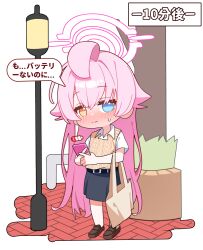  1girl ahoge bag battery_indicator black_skirt blue_archive blue_eyes blush brown_sweater_vest capry cellphone chibi collared_shirt commentary_request elbow_carry full_body halo heterochromia highres holding holding_phone hoshino_(blue_archive) huge_ahoge lamppost long_hair phone pink_hair pink_halo shirt short_sleeves skirt small_sweatdrop smartphone solo speech_bubble sweater_vest translation_request very_long_hair white_shirt yellow_eyes 