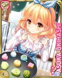  1girl backpack bag blonde_hair blue_bow blue_dress bow brown_eyes card_(medium) character_name dress flower flower_necklace food girlfriend_(kari) hair_bow holding_strap nerikiri official_art pink_bag plaid_bow plaid_clothes plaid_dress pointing_at_mouth qp:flapper skirt smile solo sparkling_eyes standing ukihashi_asuka wagashi 