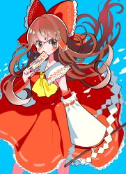  1girl absurdres ascot between_fingers blue_background blush booonyanyanya bow brown_eyes brown_hair closed_mouth commentary_request detached_sleeves frilled_bow frilled_hair_tubes frilled_skirt frills gohei hair_bow hair_tubes hakurei_reimu highres holding holding_gohei holding_ofuda long_hair looking_at_viewer ofuda ofuda_between_fingers red_bow red_skirt ribbon-trimmed_sleeves ribbon_trim simple_background skirt skirt_set smile solo touhou very_long_hair yellow_ascot 