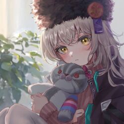  1girl backlighting black_hat blush brown_sweater charlotta_skopovskaya closed_mouth commentary_request eringi_mejiro frown grey_hair hair_between_eyes hat heaven_burns_red holding holding_stuffed_toy knees_up long_hair long_sleeves looking_at_viewer ribbed_sweater sitting solo stuffed_animal stuffed_cat stuffed_toy sweater upper_body yellow_eyes 