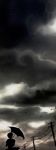  clouds copyright_request dark_sky dress funakura scenery school_uniform silhouette skirt telephone_pole umbrella 