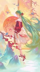  1girl absurdres acr_(dash) bird branch commentary_request flower full_body fur-trimmed_jacket fur_trim green_eyes green_hair hair_flower hair_ornament hair_stick hatsune_miku high_heels highres holding holding_umbrella jacket long_hair looking_at_viewer mountain oil-paper_umbrella parted_lips plum_blossoms red_jacket red_shoes red_shorts scroll shoes shorts skirt solo umbrella very_long_hair vocaloid white_skirt 