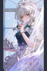  1girl absurdres apron blue_dress blue_eyes bow braid chinese_commentary collared_shirt commentary_request cup dress green_bow green_ribbon grey_hair hair_bow highres holding holding_knife holding_tray izayoi_sakuya knife long_hair looking_at_viewer maid maid_headdress neck_ribbon pillarboxed puffy_short_sleeves puffy_sleeves ribbon san_shi_qi_shi_da_mo_wang shirt short_sleeves solo teacup teapot touhou tray twin_braids waist_apron watermark white_apron white_shirt window 
