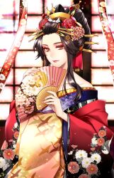  1girl black_hair flower folding_fan hair_flower hair_ornament hand_fan highres japanese_clothes kanzashi kasai_iori kimono layered_kimono lipstick looking_at_viewer makeup manaita_obi nail_polish nihongami off_shoulder oiran original red_kimono solo wide_sleeves yellow_eyes 