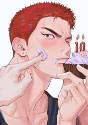  1boy 1other anger_vein birthday birthday_cake blush cake candle closed_mouth collarbone commentary cupcake ear_piercing food food_on_face highres holding holding_food one_eye_closed piercing pyogopyogoyum red_hair sakuragi_hanamichi short_hair simple_background slam_dunk_(series) solo_focus toned toned_male white_background 
