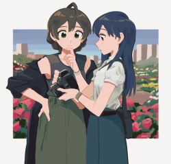  2girls ahoge bag black_coat black_tank_top blue_hair blue_skirt border brown_hair camera closed_mouth coat commentary_request dated earrings green_eyes green_skirt highres holding holding_camera idolmaster idolmaster_(classic) idolmaster_million_live! idolmaster_million_live!_theater_days jewelry kisaragi_chihaya looking_at_object multiple_girls outside_border sakuramori_kaori shirt short_hair short_sleeves shoulder_bag skirt smile standing stud_earrings tank_top tarako_oniyon white_border white_shirt 