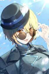  1girl :p black_coat black_dress black_hat blonde_hair blue_sky cinq_association_east_uniform coat commentary_request don_quixote_(project_moon) dress falling_petals glint hand_up hat highres korean_commentary lapels limbus_company mangsug12_40 notched_lapels petals project_moon short_hair sky solo tongue tongue_out yellow_eyes 