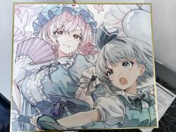  2girls absurdres black_bow black_bowtie black_hairband blue_hat blue_kimono blue_ribbon bow bowtie breasts bug butterfly chinese_commentary collared_shirt commentary_request folding_fan frilled_kimono frills green_eyes green_vest grey_hair hairband hand_fan hat highres hitodama hitodama_print holding holding_fan japanese_clothes kimono konpaku_youmu konpaku_youmu_(ghost) l0e9s29p large_breasts long_sleeves mob_cap multiple_girls neck_ribbon photo_(medium) pink_butterfly pink_eyes pink_hair ribbon saigyouji_yuyuko shikishi shirt sleeve_garter touhou traditional_media triangular_headpiece vest white_shirt wide_sleeves 