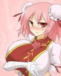  bandages blush breast_hold breasts bust directional_arrow double_bun flower huge_breasts ibaraki_kasen large_breasts looking_at_viewer oro_(zetsubou_girl) pink_background pink_hair red_eyes ribbon rose short_hair solo sweat touhou wavy_mouth 