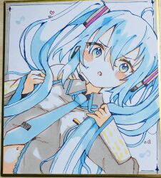  1girl :o ahoge bare_shoulders blue_eyes blue_hair blue_necktie blush_stickers collared_shirt commentary_request detached_sleeves dutch_angle grey_shirt grey_sleeves hair_between_eyes hatsune_miku heart heart-shaped_pupils highres holding_own_hair long_hair long_sleeves looking_at_viewer navel necktie parted_lips photo_(medium) shikishi shirt sleeveless sleeveless_shirt sleeves_past_wrists solo symbol-shaped_pupils te_toga tie_clip traditional_media twintails upper_body very_long_hair vocaloid wide_sleeves 