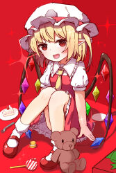  1girl absurdres ascot blonde_hair blush box cake cake_slice candy collared_shirt commentary crystal crystal_wings flandre_scarlet food fork frilled_shirt_collar frilled_skirt frills gift gift_box hat highres lollipop looking_at_viewer macaron mary_janes mob_cap multicolored_wings one_side_up open_mouth plate pointy_ears puffy_short_sleeves puffy_sleeves red_background red_eyes red_shoes red_skirt red_vest shirt shoes short_sleeves sitting skirt skirt_set smile socks solo stuffed_animal stuffed_toy subhituzi495 swirl_lollipop teddy_bear touhou vest white_hat white_shirt white_socks wings yellow_ascot 
