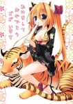  animal_ears bikini cat_ears cat_tail food mochi new_year sazaki_ichiri swimsuit tail tiger wagashi 